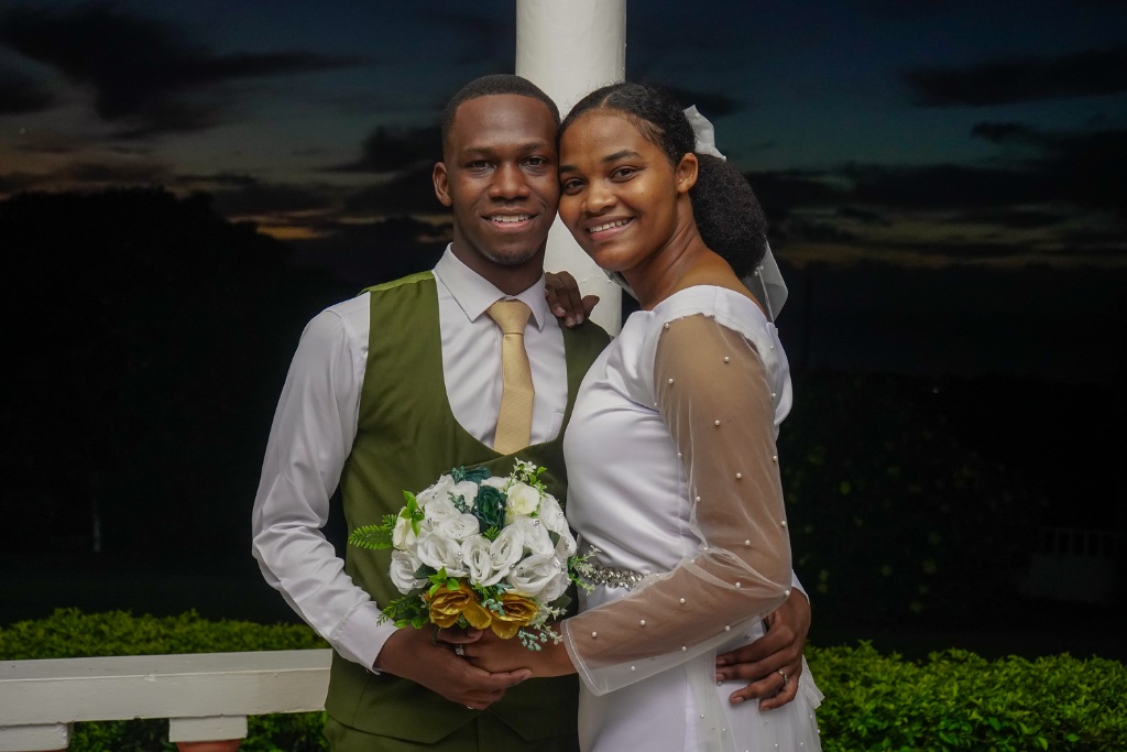 Sunset Wedding — Couple by the Pillar