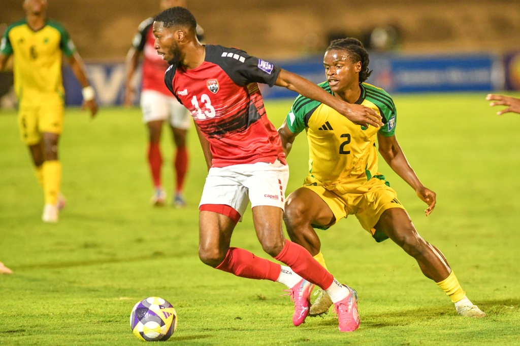 Jamaica vs Trinidad — #13 Holds Off Defender