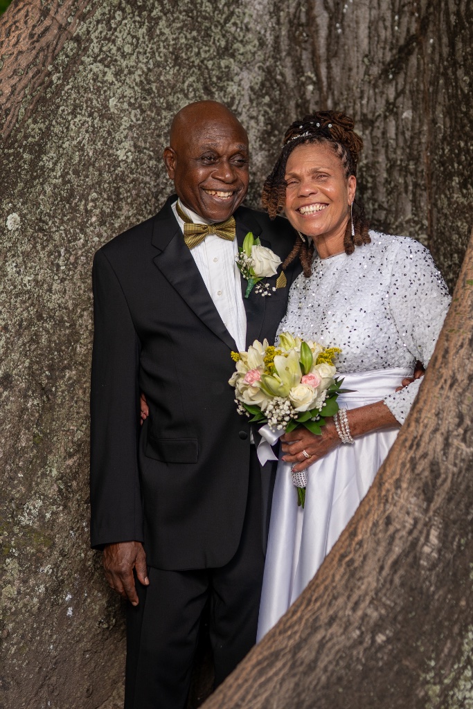 Vow Renewal — Smiling by the Tree