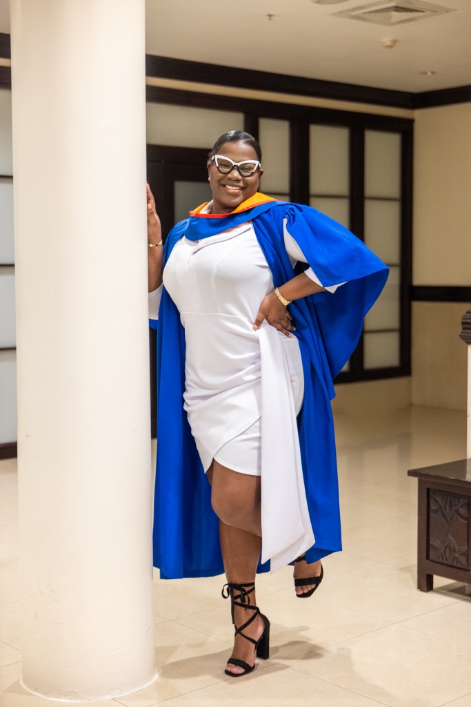 Blue Gown — Diploma & Tassel